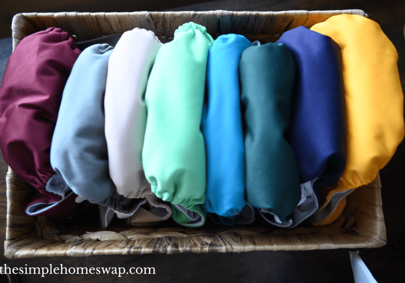 nora nursery alva baby cloth diapers in woven basket